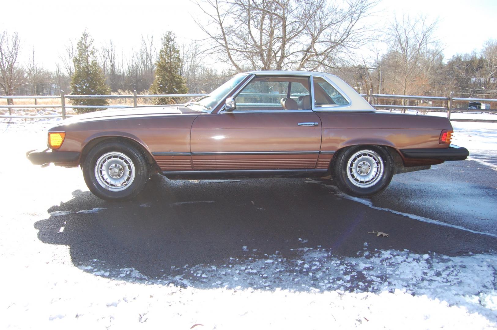 1976 Brown /Brown Leather Mercedes-Benz 450SL (10704412030) with an 4.5L V8 engine, Automatic transmission, located at 6528 Lower York Road, New Hope, PA, 18938, (215) 862-9555, 40.358707, -74.977882 - Here we have a nice 1976 Mercedes 450SL convertible with a 4.5L V8 engine putting power to the rear wheels via an automatic transmission. Some options on this vehicle include brown leather, wood trim, power windows, removable hard top, heat, A/C, AM/FM radio, cruise control, wood steering wheel, 14 - Photo#3